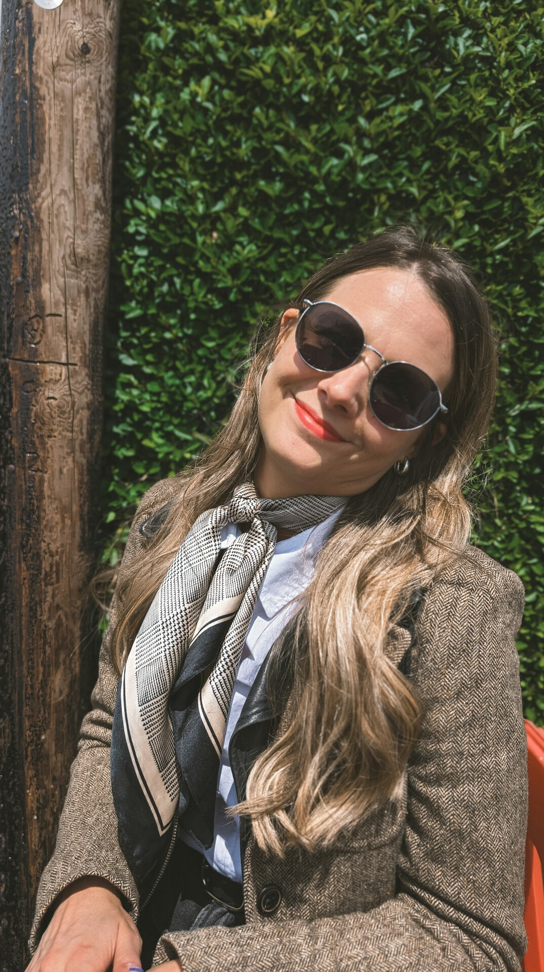 Portrait of a smiling woman in a blazer